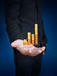 man hand holding growth graph