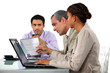 Photo: Business people working at a table Business people working at a table