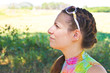 Young woman looking up