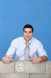 Photo: Man behind with email symbol Man behind with email symbol
