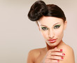 Photo: Portrait of beautiful woman , isolated on beige background Portrait of beautiful woman , isolated on beige background