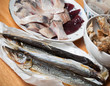 Photo: Assorted fish on wooden table. Seafood theme Assorted fish on wooden table. Seafood theme