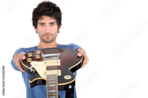 Photo: Man with an electric guitar Man with an electric guitar