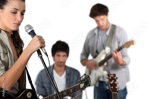 Photo: Young rock band with female vocalist Young rock band with female vocalist