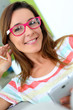 Portrait of funny girl with pink eyeglasses on
