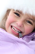 Photo: Little girl stood outdoors in winter clothing Little girl stood outdoors in winter clothing