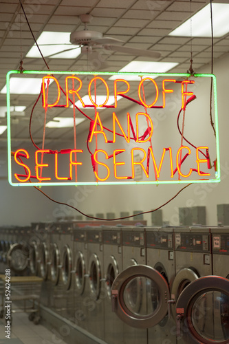 Photo: laundromat interior and sign laundromat interior and sign