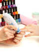 Manicure process in beauty salon, close up