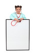 A little girl playing at being a doctor.
