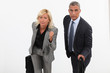 Two businesspeople about to race