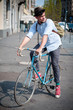 hipster young man on bike
