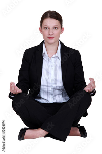 Photo: Woman practising yoga Woman practising yoga