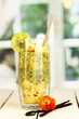 Delicious fruit smoothie on wooden table on window background