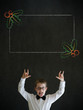 Knowledge rocks boy business man with Christmas holly checklist