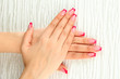 Closeup of hands of young woman with elegance manicure