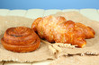 Composition with buns in wicker basket,