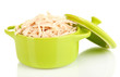 Shredded boiled chicken in green pan isolated on white