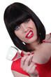 Woman in red with an empty wine glass