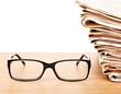 Foto: Glasses and newspapers Glasses and newspapers
