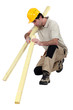 carpenter with lumber at work