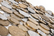 pile of different coins on isolated background
