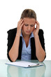 office worker suffering from headache
