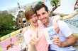 Couple of travelers visiting Guell Park