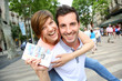 Cheerful couple in La Rambla of Barcelona