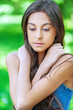 Foto: Dark-haired girl in jeans jacket Dark-haired girl in jeans jacket