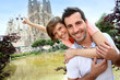 Couple standing by the Sagrada familia church, Spain