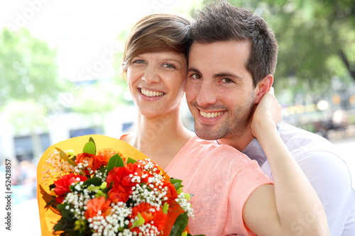 Photo: Girl receiving flowers from boyfriend Girl receiving flowers from boyfriend