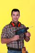 Photo: Man with drill Man with drill