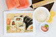 cooking  sushi  with tablet