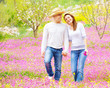 Loving couple walking in spring park