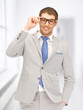 happy businessman in spectacles