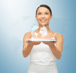 Foto: woman with tablet pc and virtual screen woman with tablet pc and virtual screen
