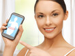 woman pointing at smartphone with application