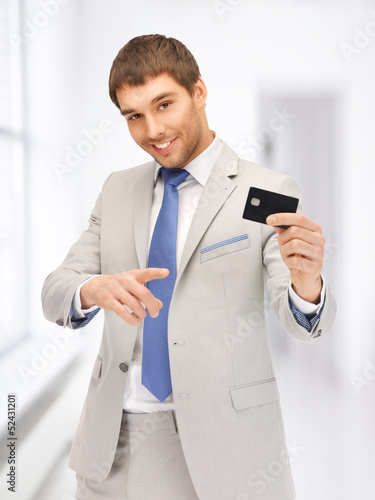 Photo: businessman with credit card businessman with credit card