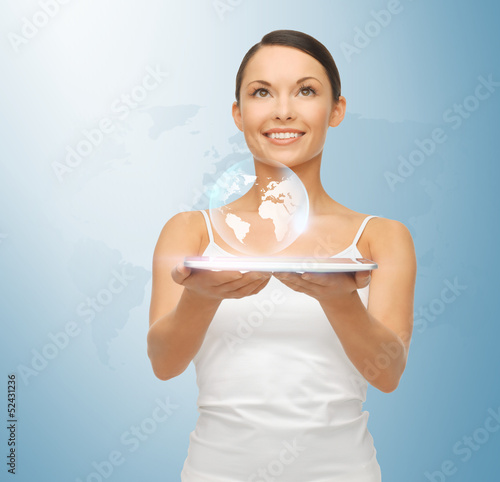 Photo: woman with tablet pc and virtual screen woman with tablet pc and virtual screen