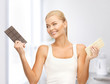 smiling woman with dark and white chocolates