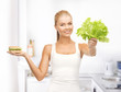 woman with green leaves and hamburger