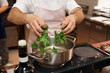 Chef is putting corn salad in casserole