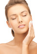 beautiful woman with cotton pad