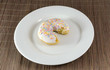 Donut with chunk bitten off