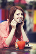 Style redhead girl with cake and cup