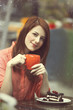 Style redhead girl with cake and cup