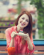 Style redhead girl with cake and cup