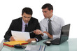 Two businessmen working