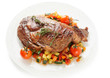 Ribeye steak with stir fried vegetables isolated on white