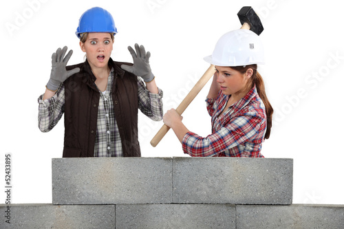 Photo: Destroying a wall. Destroying a wall.